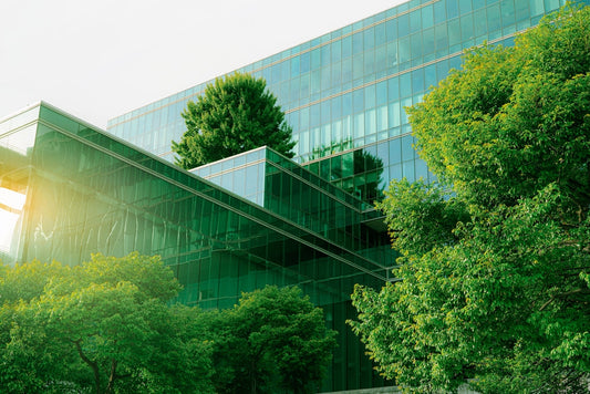 Beautitful glass office building with trees