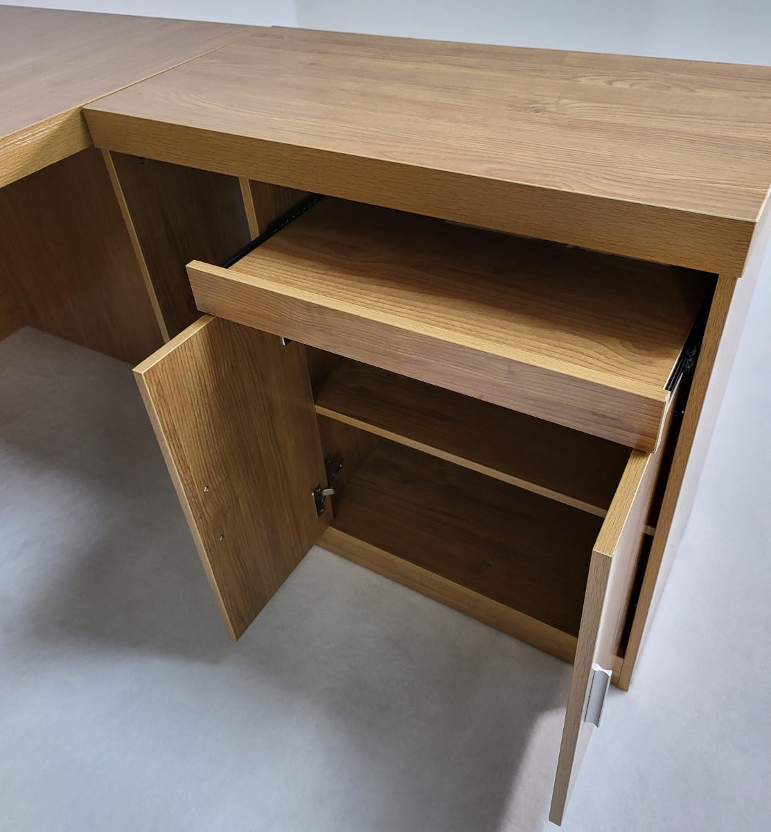 Modern oak deals desk with drawers