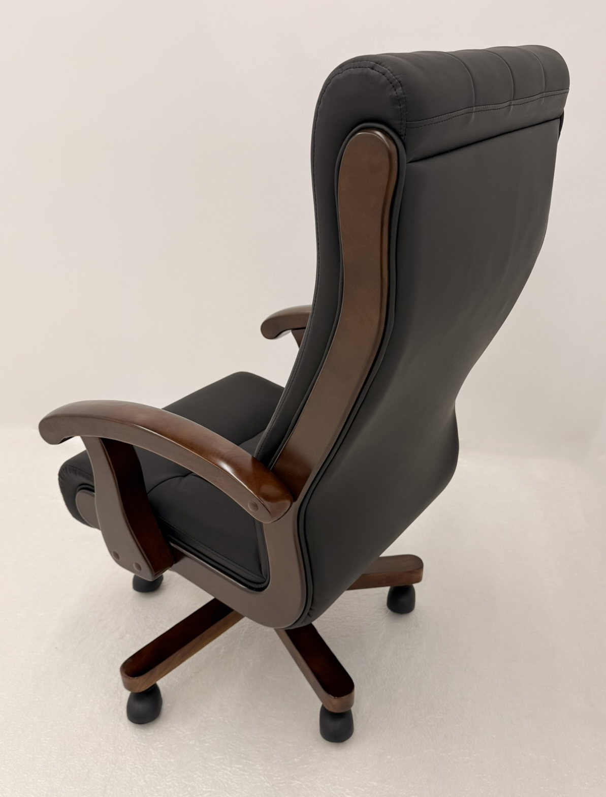 Chesterfield High Back Genuine Black Leather Office Chair with Walnut Veneered Arms - B29