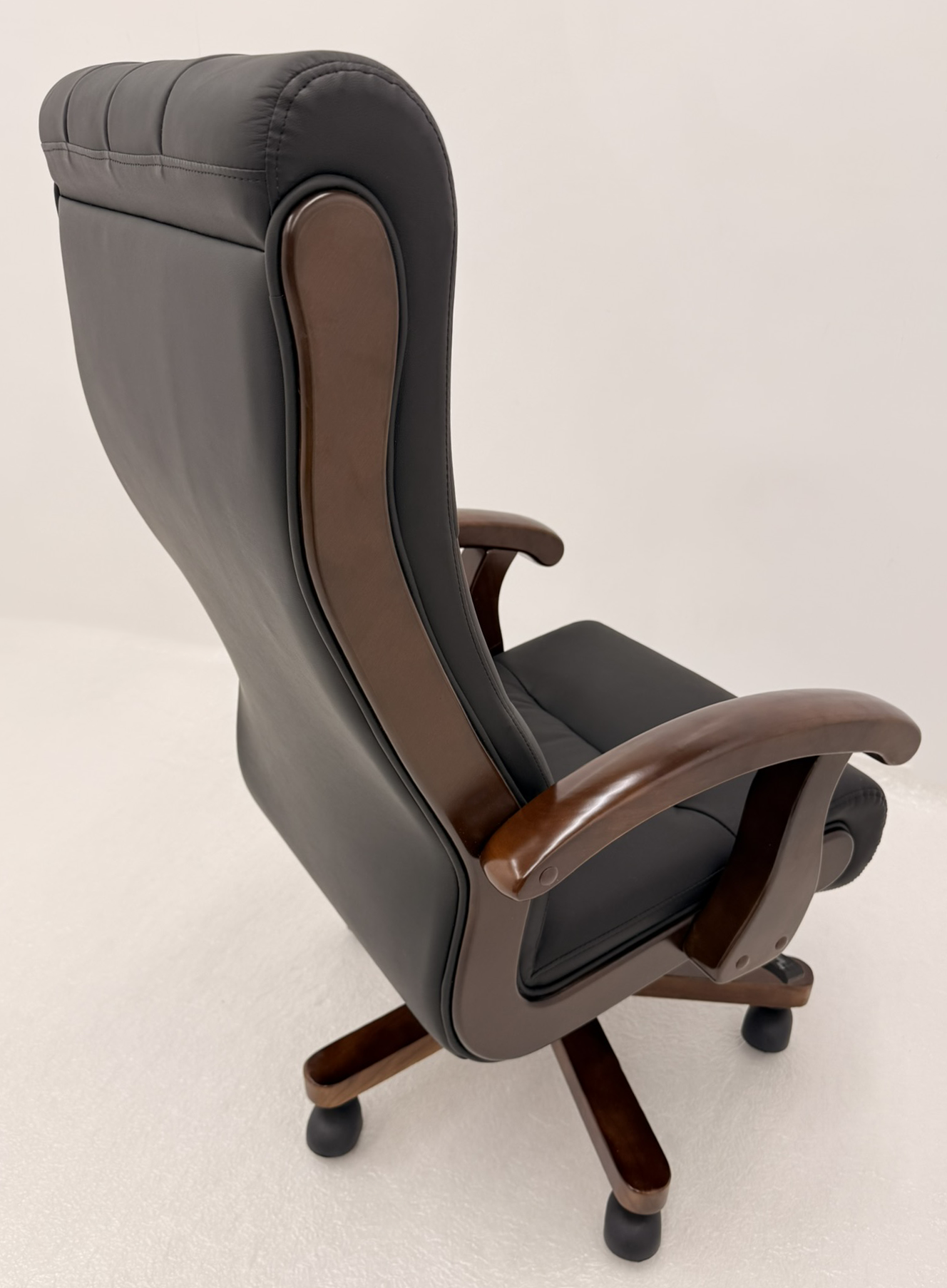 Chesterfield High Back Genuine Black Leather Office Chair with Walnut Veneered Arms - B29